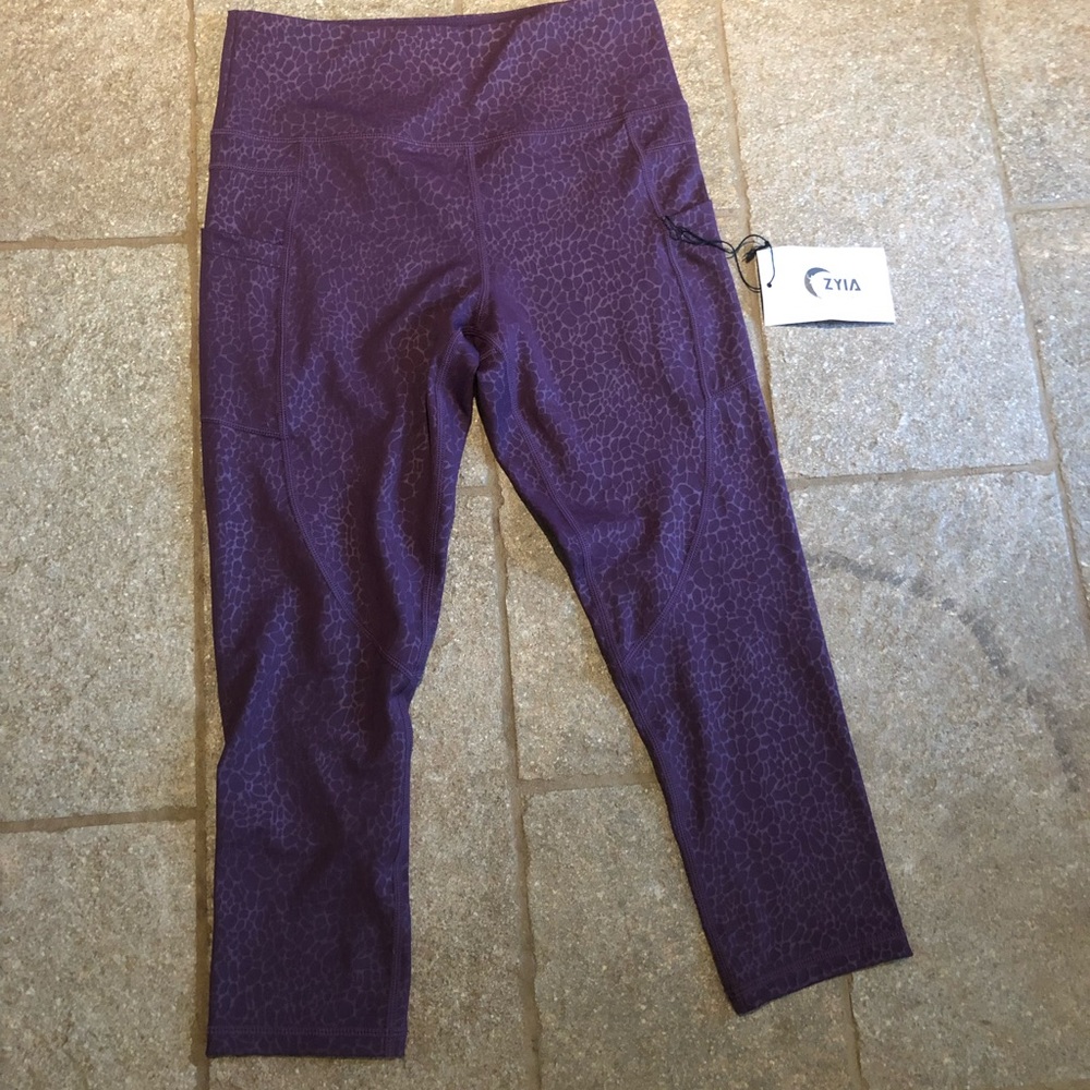 NWT Zyia Active brand purple capri leggings - size 6/8 or medium